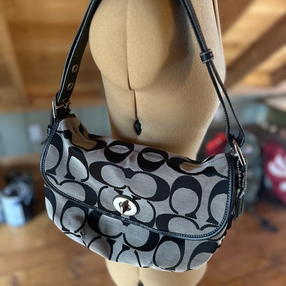 Coach Handbags - Coach Soho bag satchel. Black leather and canvas. C logo monogram. Flap closure